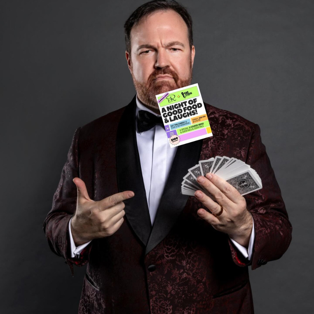 Holding a deck of cards and a promotional flyer, Matt Donnelly exudes confidence, setting the stage for an evening of mesmerizing entertainment.